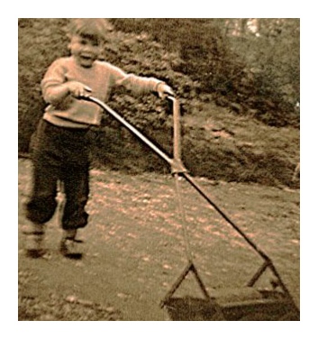 Will steps out with his first mower in Church Road Steep in 1956.