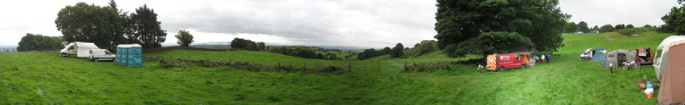 Wales Weekend typical scene showing campsite with view over lower field, some of the sections are top right.